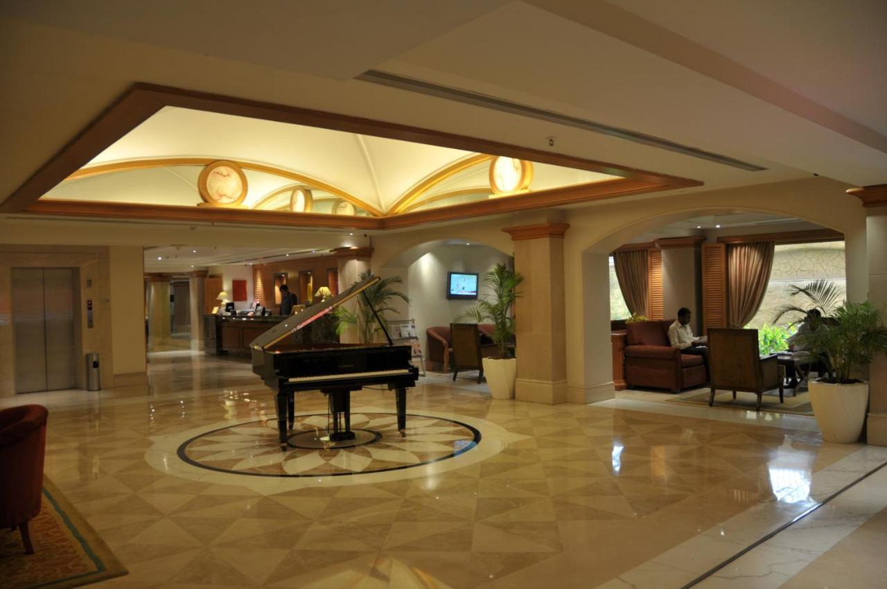 Ramada Plaza By Wyndham Palm Grove Hotel Mumbai Bagian luar foto Lobby