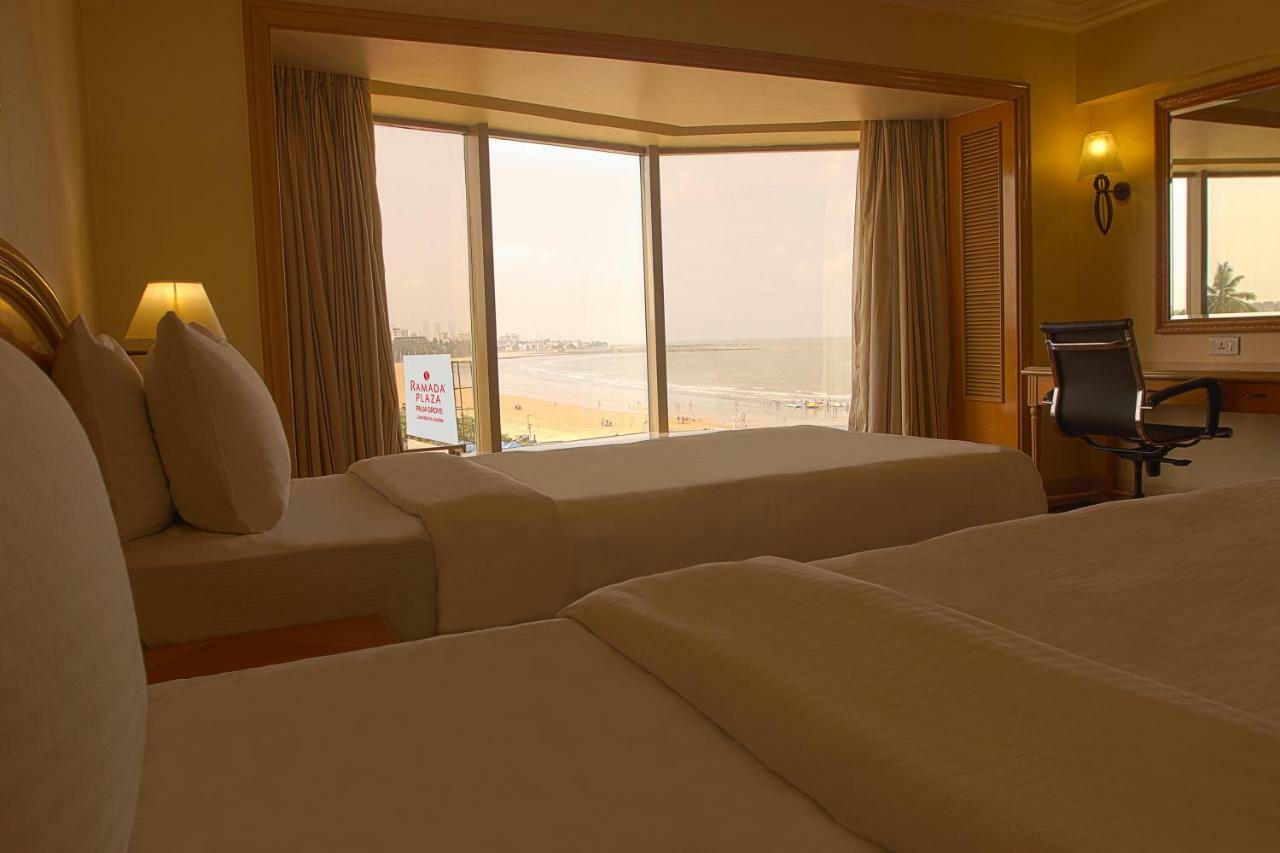 Ramada Plaza By Wyndham Palm Grove Hotel Mumbai Bagian luar foto A room at the hotel